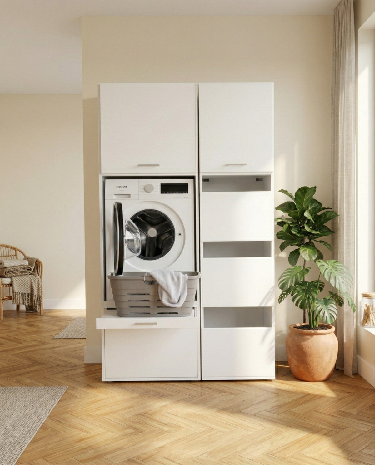 White freestanding laundry center with front-loading washer and stacked storage cabinets in bright room.