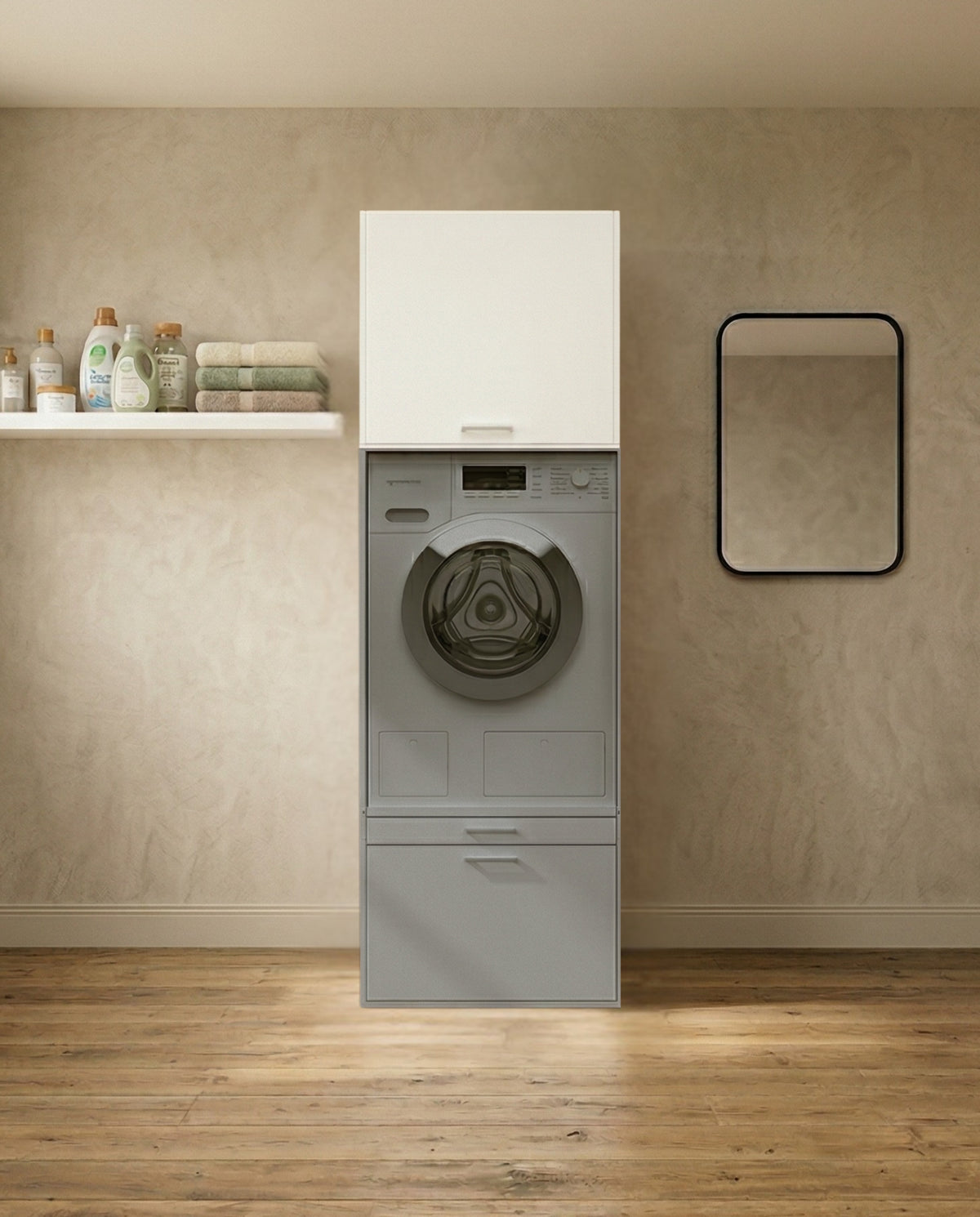 Gray front-load washing machine with white storage cabinet mounted above, in minimalist laundry room with wood floor and.